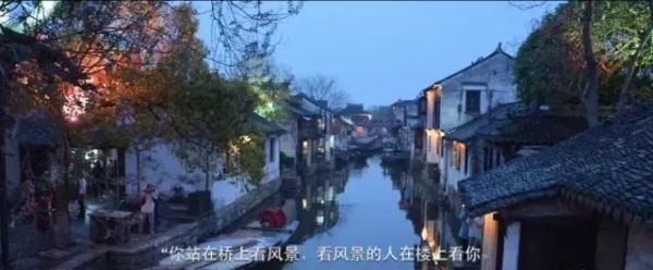 你站在桥上看风景来自，看风景的人在楼上看你，全诗有什么含义？